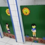 Banheiros decorados dos meninos e das meninas mostrando todo o cuidado e carinho com as crianças do Infantil e 1º ano do Colégio Mirassol.